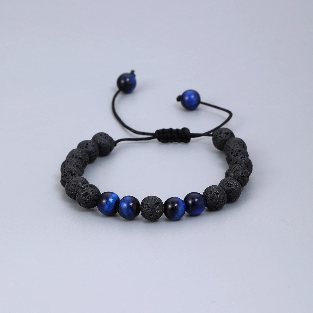 Volcanic stone blue tiger eye with woven adjustable bracelet elastic rope