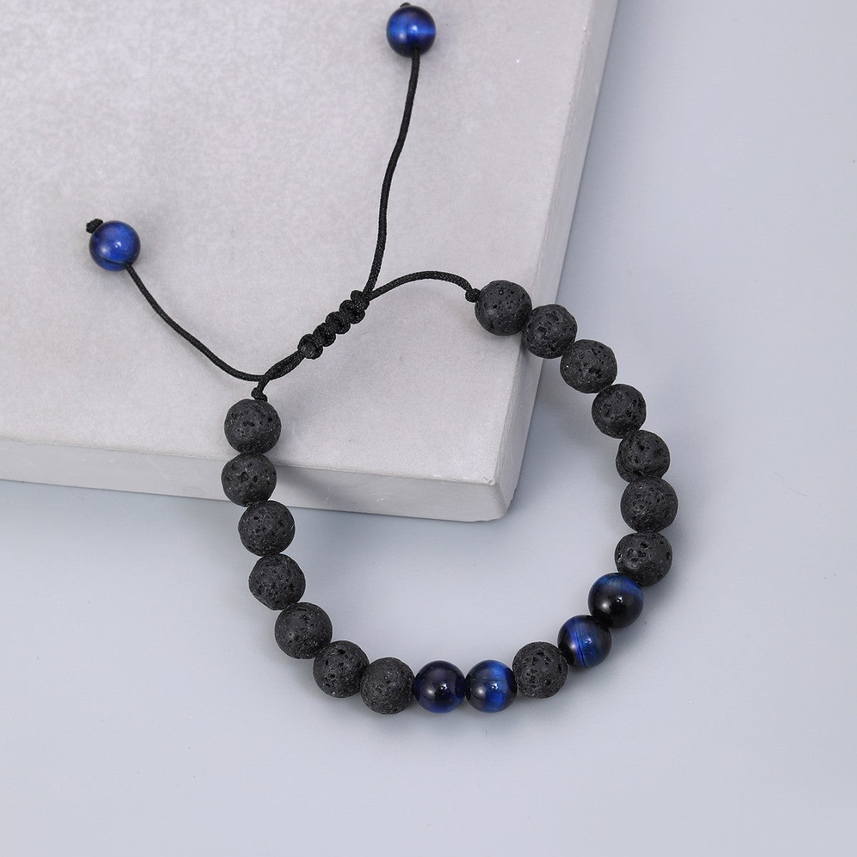 Volcanic stone blue tiger eye with woven adjustable bracelet elastic rope