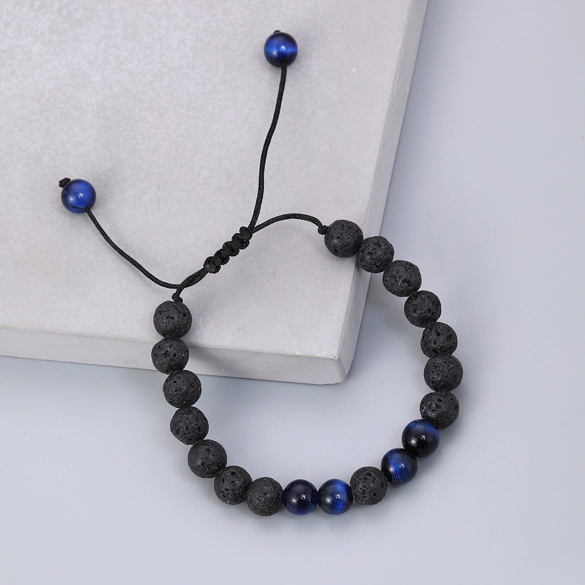 Volcanic stone blue tiger eye with woven adjustable bracelet elastic rope